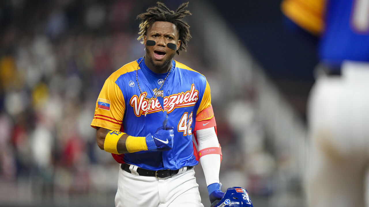 MIAMI, FLORIDA - MARCH 18: Ronald Acuna Jr. #42 of Venezuela reacts after hitting a double during the eighth inning during a 2023 World Baseball Classic Quarterfinal game against the United States at loanDepot park on March 18, 2023 in Miami, Florida.