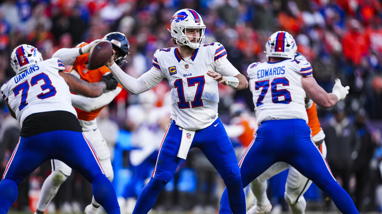DENVER, COLORADO - JANUARY 17: Josh Allen #17 of the Buffalo Bills throws the ball during an NFL divisional playoff football game against the Denver Broncos at Empower Field at Mile High on January 17, 2026 in Denver, Colorado.