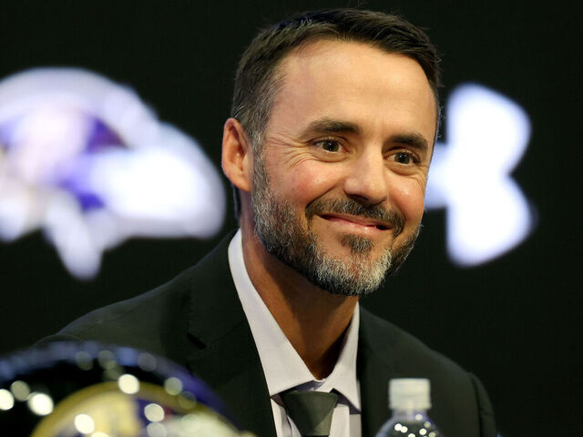 OWINGS MILLS, MARYLAND - JANUARY 29: New Baltimore Ravens head coach Jesse Minter is introduced during a news conference at Under Armour Performance Center Baltimore Ravens on January 29, 2026 in Owings Mills, Maryland.