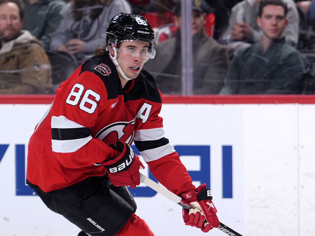 NEWARK, NEW JERSEY - JANUARY 27: Jack Hughes #86 of the New Jersey Devils controls the puck during the second period against the Winnipeg Jets at Prudential Center on January 27, 2026 in Newark, New Jersey.