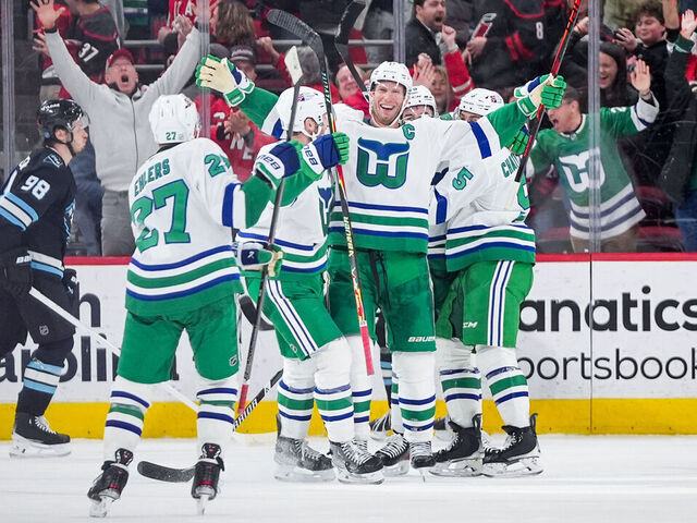 RALEIGH, NORTH CAROLINA - JANUARY 29: The Carolina Hurricanes celebrate a win during the third period against the Utah Mammoth at Lenovo Center on January 29, 2026 in Raleigh, North Carolina.