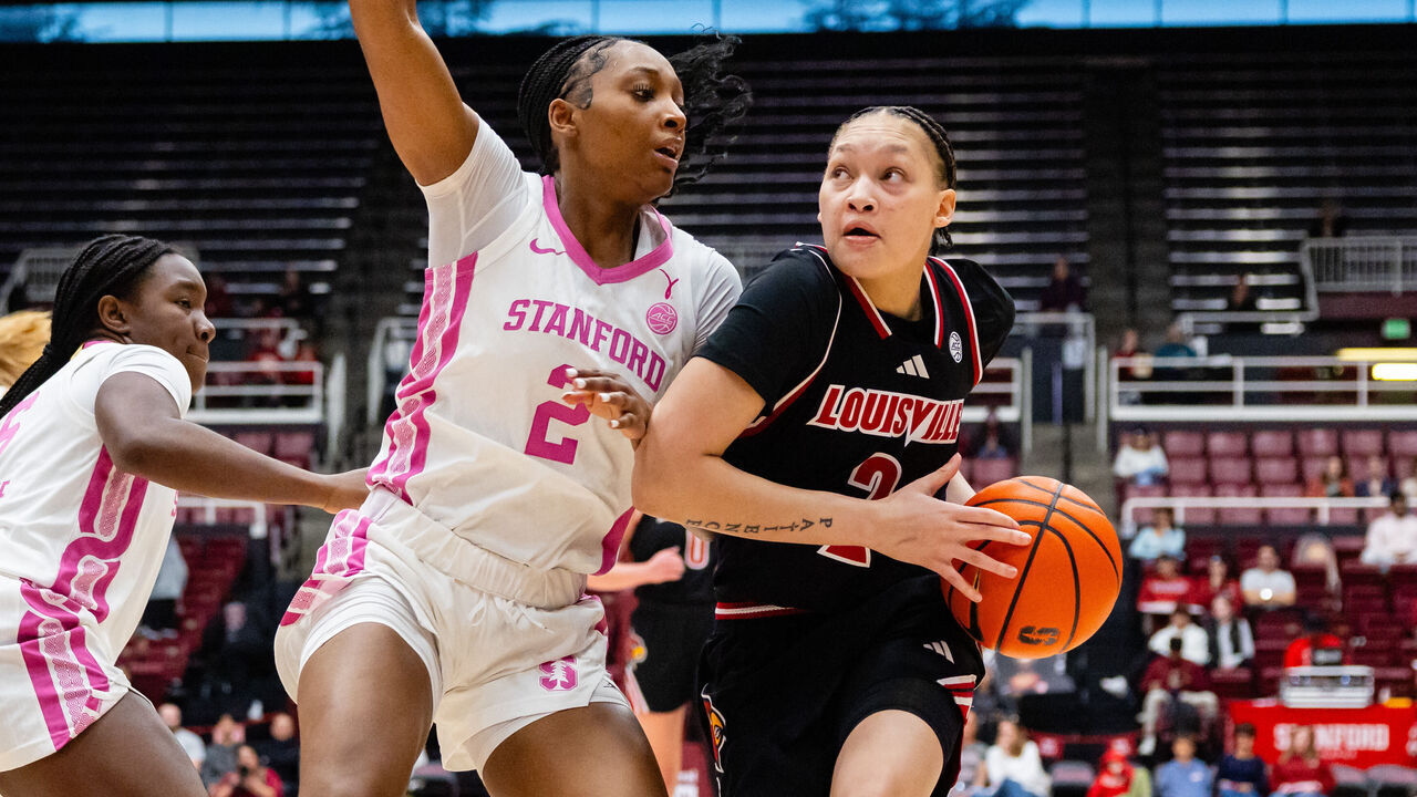 STANFORD, CA - JANUARY 29: Imari Berry #2 of the Louisville Cardinals drives against Hailee Swain #2 of the Stanford Cardinal during a game on January 29, 2026 at Maples Pavilion in Stanford, CA.