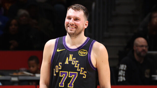 WASHINGTON, DC - JANUARY 30: Luka Doncic #77 of the Los Angeles Lakers smiles /stg/ against the Washington Wizards on January 30, 2026 at Capital One Arena in Washington, DC. Mandatory Copyright Notice: Copyright 2026 NBAE