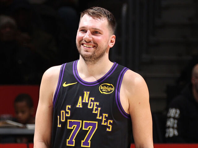 WASHINGTON, DC - JANUARY 30: Luka Doncic #77 of the Los Angeles Lakers smiles /stg/ against the Washington Wizards on January 30, 2026 at Capital One Arena in Washington, DC. Mandatory Copyright Notice: Copyright 2026 NBAE