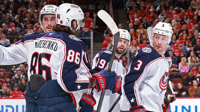 CHICAGO, ILLINOIS - JANUARY 30: Charlie Coyle #3 of the Columbus Blue Jackets celebrates with teammates after scoring against the Chicago Blackhawks in the first period at the United Center on January 30, 2026 in Chicago, Illinois.