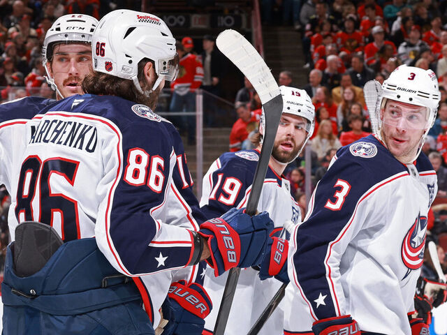 CHICAGO, ILLINOIS - JANUARY 30: Charlie Coyle #3 of the Columbus Blue Jackets celebrates with teammates after scoring against the Chicago Blackhawks in the first period at the United Center on January 30, 2026 in Chicago, Illinois.