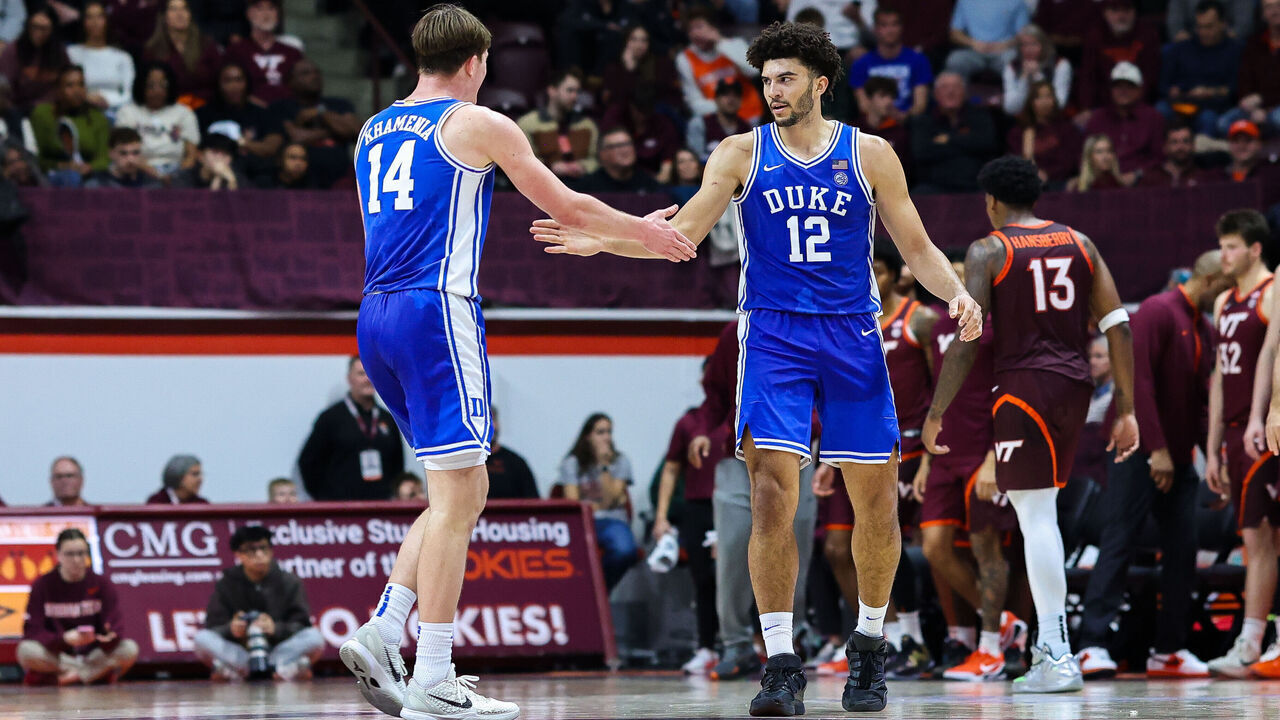 BLACKSBURG, VIRGINIA - JANUARY 31: Nikolas Khamenia #14 and Cameron Boozer #12 of the Duke Blue Devils react in the second half during a game against the Virginia Tech Hokies at Cassell Coliseum on January 31, 2026 in Blacksburg, Virginia.