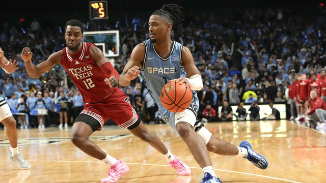 ORLANDO, FL - JANUARY 31: UCF Knights guard Themus Fulks (1) drives to the basket during the basketball game between the UCF Knights and the Texas Tech RedRaiders on January 31st, 2026 at Addition Financial Arena in Orlando, FL.