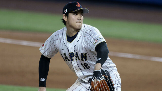 MIAMI, FL - MARCH 21: Shohei Ohtani #16 of Team Japan pitches in the top of the 9th inning during World Baseball Classic Championship between United States and Japan at loanDepot park on March 21, 2023 in Miami, Florida.