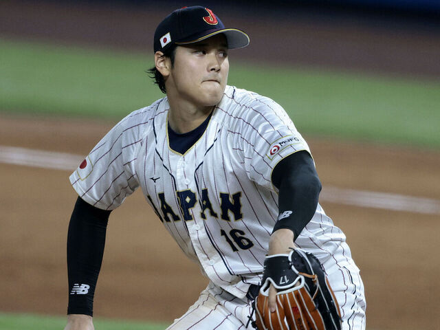 MIAMI, FL - MARCH 21: Shohei Ohtani #16 of Team Japan pitches in the top of the 9th inning during World Baseball Classic Championship between United States and Japan at loanDepot park on March 21, 2023 in Miami, Florida.