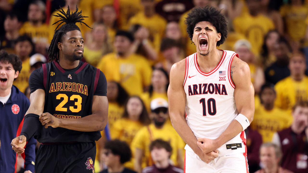 TEMPE, ARIZONA - JANUARY 31: Koa Peat #10 of the Arizona Wildcats reacts in front of Allen Mukeba #23 of the Arizona State Sun Devils after a dunk during the second half at Desert Financial Arena on January 31, 2026 in Tempe, Arizona.