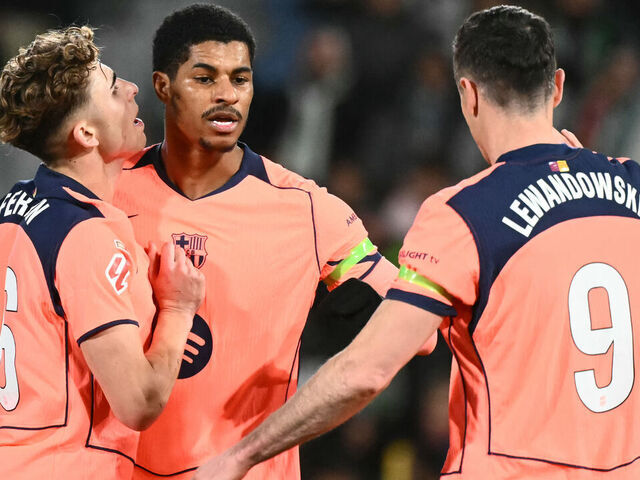 Barcelona's English forward #14 Marcus Rashford (C) celebrates with Barcelona's Spanish midfielder #16 Fermin Lopez and Barcelona's Polish forward #09 Robert Lewandowski after scoring his team's third goal during the Spanish league football match between Elche CF and FC Barcelona at thge Martinez Valero stadium in Elche on January 31, 2026.