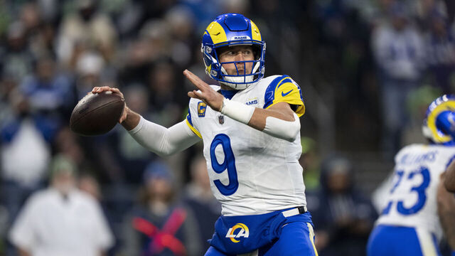 SEATTLE, WASHINGTON - JANUARY 25: Matthew Stafford #9 of the Los Angeles Rams looks to pass during an NFC Championship NFL football game against the Seattle Seahawks at Lumen Field on January 25, 2026 in Seattle, Washington.