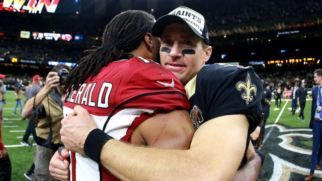 NEW ORLEANS, LOUISIANA - OCTOBER 27: Drew Brees #9 of the New Orleans Saints is congratulated by Larry Fitzgerald #11 of the Arizona Cardinals after a NFL game at the Mercedes Benz Superdome on October 27, 2019 in New Orleans, Louisiana.
