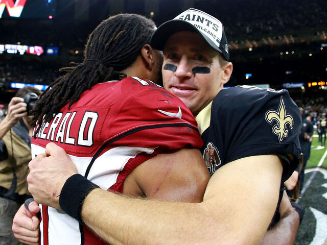 NEW ORLEANS, LOUISIANA - OCTOBER 27: Drew Brees #9 of the New Orleans Saints is congratulated by Larry Fitzgerald #11 of the Arizona Cardinals after a NFL game at the Mercedes Benz Superdome on October 27, 2019 in New Orleans, Louisiana.
