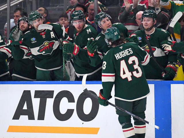 EDMONTON, CANADA - JANUARY 31: Quinn Hughes #43 of the Minnesota Wild celebrates a second-period goal at the bench during the game against the Edmonton Oilers at Rogers Place on January 31, 2026, in Edmonton, Alberta, Canada.