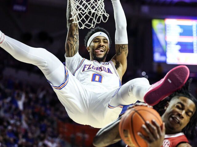 GAINESVILLE, FLORIDA - FEBRUARY 1: Boogie Fland #0 of the Florida Gators dunks the ball during the first half of a game against the Alabama Crimson Tide at the Stephen C. O'Connell Center on February 1, 2026 in Gainesville, Florida.