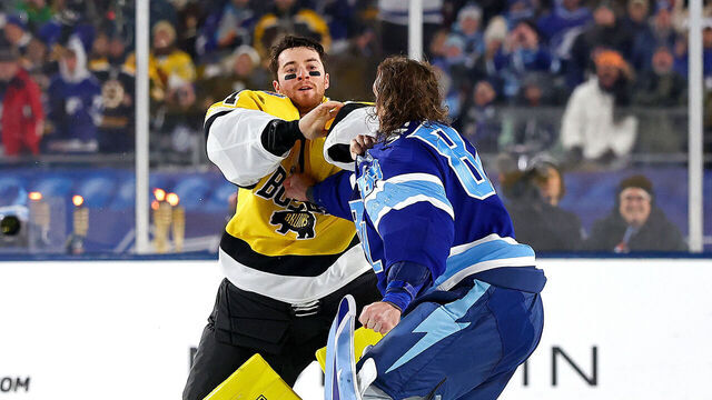 TAMPA, FLORIDA - FEBRUARY 01: Jeremy Swayman #1 of the Boston Bruins and Andrei Vasilevskiy #88 of the Tampa Bay Lightning fight during the second period of the 2026 NHL Stadium Series at Raymond James Stadium on February 01, 2026 in Tampa, Florida.