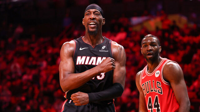 MIAMI, FLORIDA - FEBRUARY 01: Bam Adebayo #13 of the Miami Heat celebrates after a dunk in front of Patrick Williams #44 of the Chicago Bulls during the second quarter of the game at Kaseya Center on February 01, 2026 in Miami, Florida.