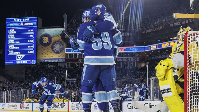 TAMPA, FL - FEBRUARY 1: Nick Paul #20 of the Tampa Bay Lightning celebrates a goal with teammates Darren Raddysh #43 and Jake Guentzel #59 against the Boston Bruins during the second period during the 2026 Navy Federal Credit Union NHL Stadium Series game at Raymond James Stadium on February 1, 2026 in Tampa, Florida.