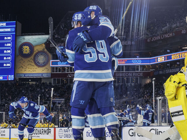 TAMPA, FL - FEBRUARY 1: Nick Paul #20 of the Tampa Bay Lightning celebrates a goal with teammates Darren Raddysh #43 and Jake Guentzel #59 against the Boston Bruins during the second period during the 2026 Navy Federal Credit Union NHL Stadium Series game at Raymond James Stadium on February 1, 2026 in Tampa, Florida.