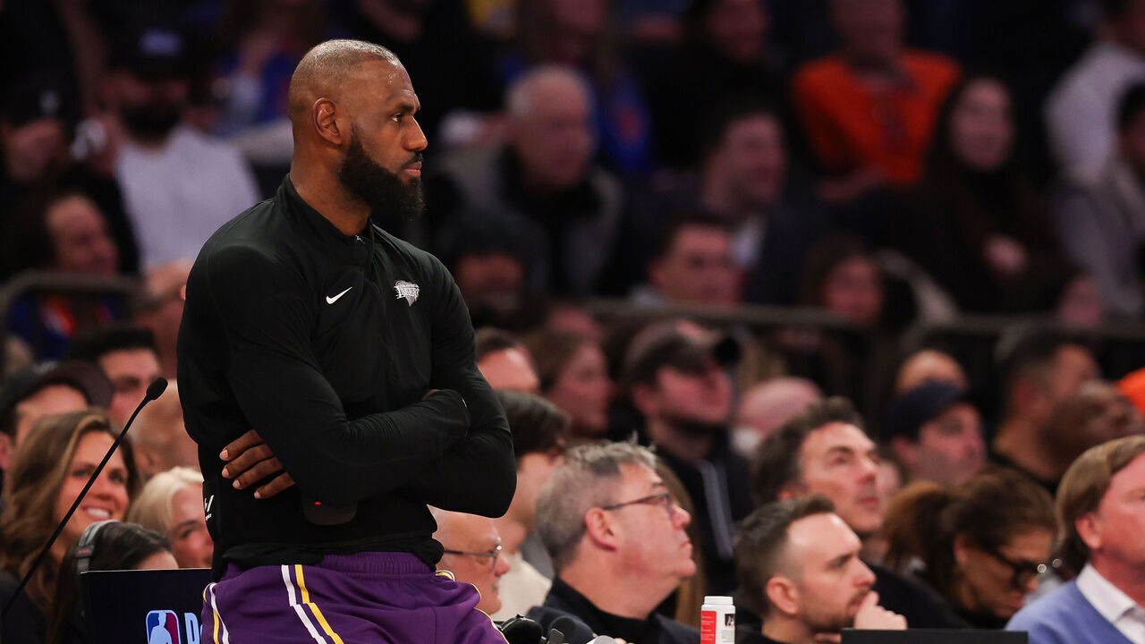 NEW YORK, NEW YORK - FEBRUARY 01: LeBron James #23 of the Los Angeles Lakers sits on the sidelines before going into the game during the fourth quarter against the New York Knicks at Madison Square Garden on February 01, 2026 in New York City.