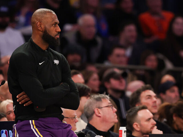 NEW YORK, NEW YORK - FEBRUARY 01: LeBron James #23 of the Los Angeles Lakers sits on the sidelines before going into the game during the fourth quarter against the New York Knicks at Madison Square Garden on February 01, 2026 in New York City.