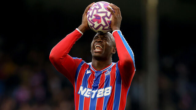 LONDON, ENGLAND - OCTOBER 18: Jean-Philippe Mateta of Crystal Palace holds the match ball after his hat-trick but reacts possibly with thoughts of a late missed chance - during the Premier League match between Crystal Palace and Bournemouth at Selhurst Park on October 18, 2025 in London, England.