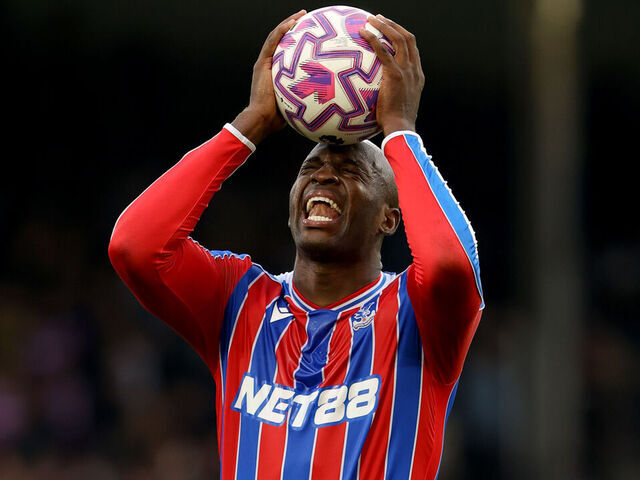 LONDON, ENGLAND - OCTOBER 18: Jean-Philippe Mateta of Crystal Palace holds the match ball after his hat-trick but reacts possibly with thoughts of a late missed chance - during the Premier League match between Crystal Palace and Bournemouth at Selhurst Park on October 18, 2025 in London, England.