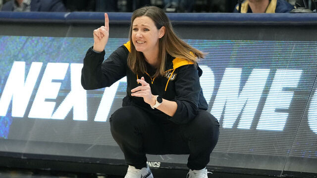 WASHINGTON, DC - JANUARY 22: Head coach Beth O'Boyle of the VCU Rams signals to her players during a womens college basketball game against the George Washington Colonials at the Smith Center on January 22, 2023 in Washington, DC.