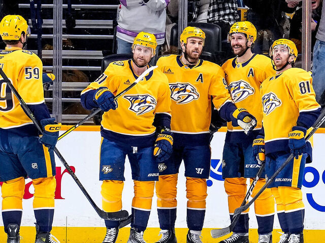 NASHVILLE, TENNESSEE - FEBRUARY 2: Ryan O'Reilly #90 celebrates his goal with Filip Forsberg #9, Jonathan Marchessault #81, Steven Stamkos #91 and Roman Josi #59 of the Nashville Predators against the St. Louis Blues during an NHL game at Bridgestone Arena on February 2, 2026 in Nashville, Tennessee.
