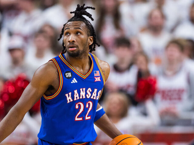 LUBBOCK, TEXAS - FEBRUARY 02: Darryn Peterson #22 of the Kansas Jayhawks handles the ball during the first half of the game against the Texas Tech Red Raiders at United Supermarkets Arena on February 02, 2026 in Lubbock, Texas.