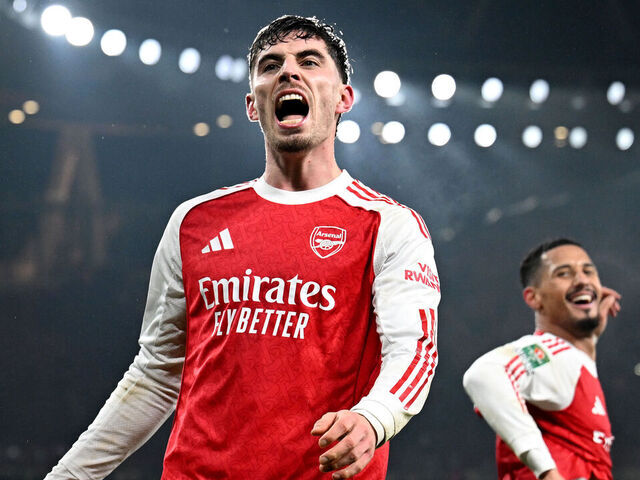 LONDON, ENGLAND - FEBRUARY 03: Kai Havertz of Arsenal celebrates scoring his team's first goal with teammate William Saliba during the Carabao Cup Semi Final Second Leg match between Arsenal and Chelsea at Emirates Stadium on February 03, 2026 in London, England.