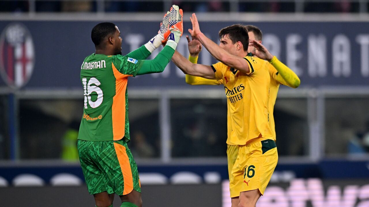 BOLOGNA, ITALY - FEBRUARY 03: Mike Maignan of AC Milan celebrates with Matteo Gabbia of AC Milan during the Serie A match between Bologna FC 1909 and AC Milan at Renato Dall'Ara Stadium on February 03, 2026 in Bologna, Italy.