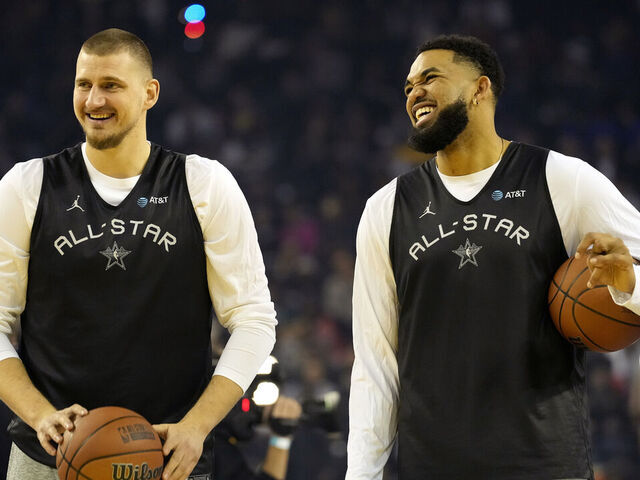OAKLAND, CALIFORNIA - FEBRUARY 15: Nikola Jokic #15 of the Denver Nuggets and Chuck's Global Stars and Karl-Anthony Towns #32 of the New York Knicks and Chuck's Global Stars talk during 2025 NBA All-Star Practice & Media Availability at Oakland Arena on February 15, 2025 in Oakland, California.