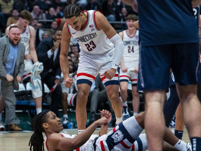 HARTFORD, CONNECTICUT - FEBRUARY 03: Jayden Ross #23 and Silas Demary Jr. #2 of the Connecticut Huskies react during the second half of an NCAA men's basketball game against the Xavier Musketeers at PeoplesBank Arena on February 03, 2026 in Hartford, Connecticut.