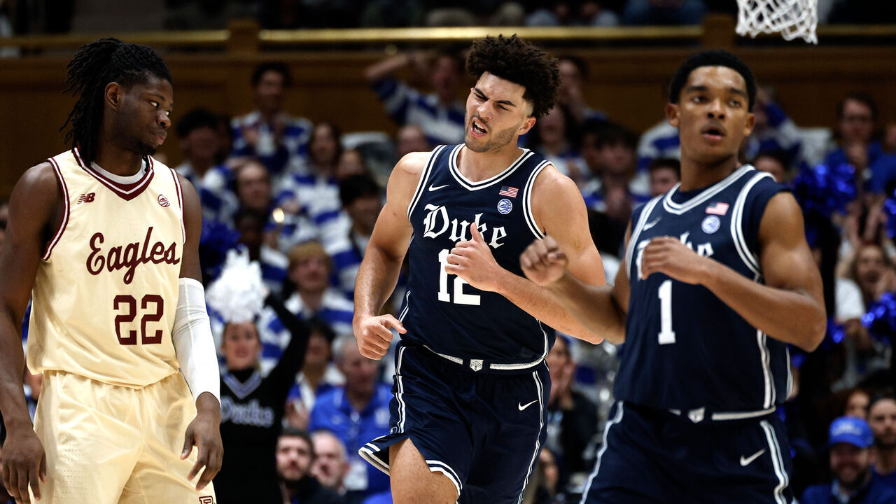 DURHAM, NORTH CAROLINA - FEBRUARY 3: Cameron Boozer #12 of the Duke Blue Devils reacts following a basket as Jayden Hastings #22 of the Boston College Eagles looks on in the first half at Cameron Indoor Stadium on February 3, 2026 in Durham, North Carolina.
