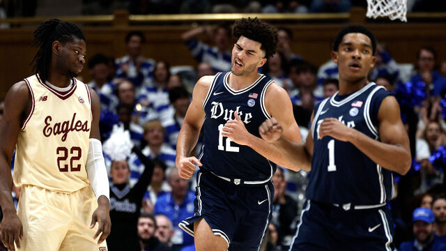 DURHAM, NORTH CAROLINA - FEBRUARY 3: Cameron Boozer #12 of the Duke Blue Devils reacts following a basket as Jayden Hastings #22 of the Boston College Eagles looks on in the first half at Cameron Indoor Stadium on February 3, 2026 in Durham, North Carolina.