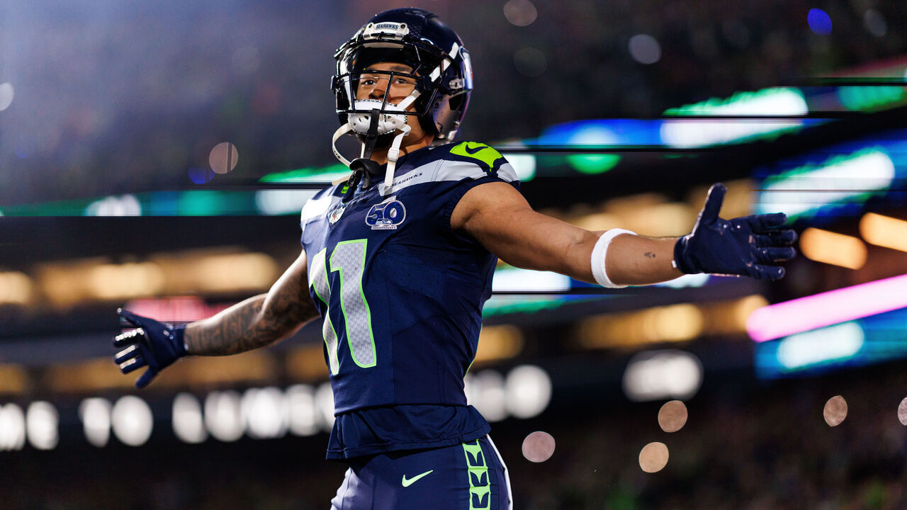 SEATTLE, WASHINGTON - JANUARY 17: Jaxon Smith-Njigba #11 of the Seattle Seahawks enters the field during player introductions prior to an NFL divisional playoff football game against the San Francisco 49ers at Lumen Field on January 17, 2026 in Seattle, Washington.