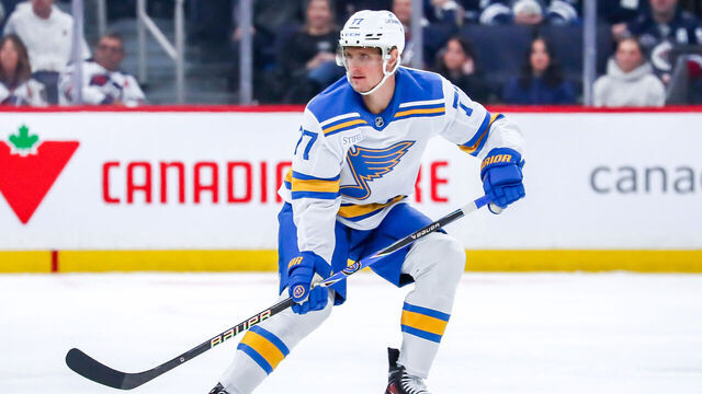 WINNIPEG, CANADA - JANUARY 20: Nick Bjugstad #77 of the St. Louis Blues keeps an eye on the play during first period action against the Winnipeg Jets at the Canada Life Centre on January 20, 2026 in Winnipeg, Manitoba, Canada. The Jets defeated the Blues 3-1.