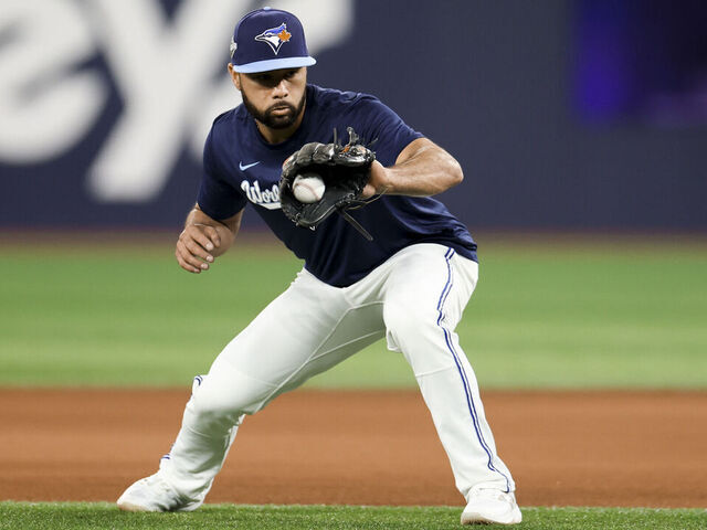 TORONTO, ON - OCTOBER 31: Isiah Kiner-Falefa #7 of the Toronto Blue Jays fields a ball during warm ups prior to Game Six of the 2025 World Series presented by Capital One between the Los Angeles Dodgers and the Toronto Blue Jays at Rogers Centre on Friday, October 31, 2025 in Toronto, Ontario, Canada.