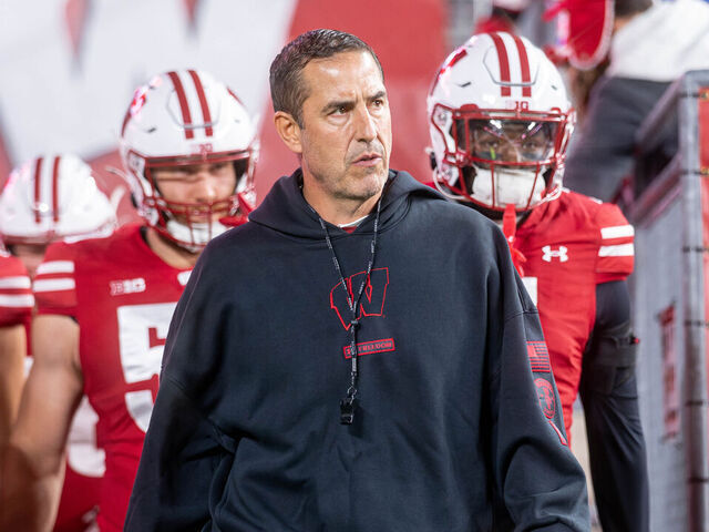 Wisconsin Badgers head coach Luke Fickell leads the Wisconsin Badgers onto the field before playing the Illinois Fighting Illini at Camp Randall Stadium in Madison, Wisconsin, on November 22, 2025.