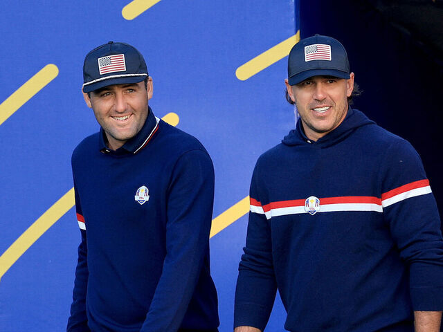 ROME, ITALY - SEPTEMBER 30: Scottie Scheffler of The United States Team and his partner Brooks Koepka walk onto the tee on the first hole in their match against Ludwig Aberg and Viktor Hovland during the Saturday morning foursomes matches of the 2023 Ryder Cup at Marco Simone Golf Club on September 30, 2023 in Rome, Italy.
