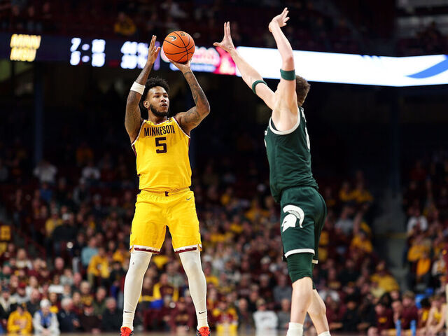MINNEAPOLIS, MINNESOTA - FEBRUARY 04: Jaylen Crocker-Johnson #5 of the Minnesota Golden Gophers shoots the ball against Jaxon Kohler #0 of the Michigan State Spartans in the first half at Williams Arena on February 04, 2026 in Minneapolis, Minnesota.