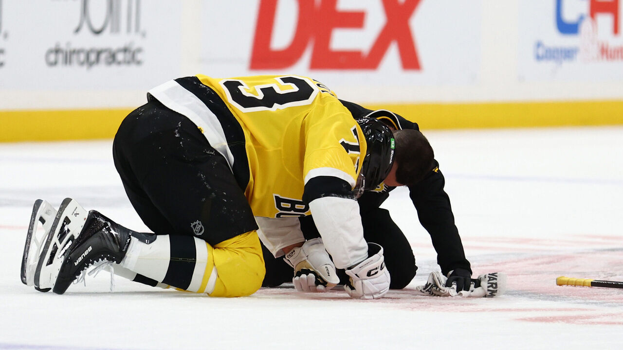 SUNRISE, FLORIDA - FEBRUARY 04: Charlie McAvoy #73 of the Boston Bruins rests on the ice following an injury in the first period against the Florida Panthers at Amerant Bank Arena on February 04, 2026 in Sunrise, Florida.