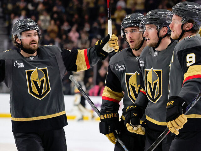 LAS VEGAS, NEVADA - FEBRUARY 04: Rasmus Andersson #4, Noah Hanifin #15, Ivan Barbashev #49 and Jack Eichel #9 of the Vegas Golden Knights celebrate Barbashev's second-period goal against the Vancouver Canucks during their game at T-Mobile Arena on February 04, 2026 in Las Vegas, Nevada.