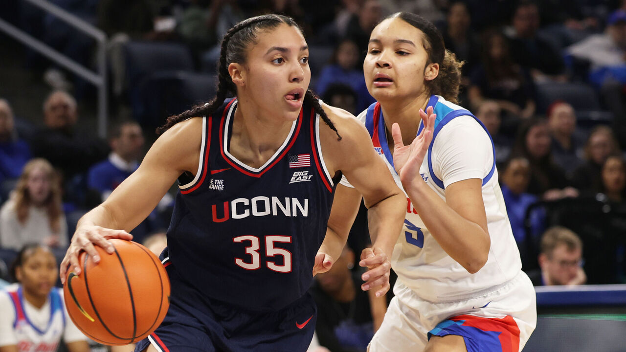 CHICAGO, ILLINOIS - FEBRUARY 4: Azzi Fudd #35 of the UConn Huskies dribbles past Alayna West #3 of the DePaul Blue Demons during the first half at Wintrust Arena on February 4, 2026 in Chicago, Illinois.