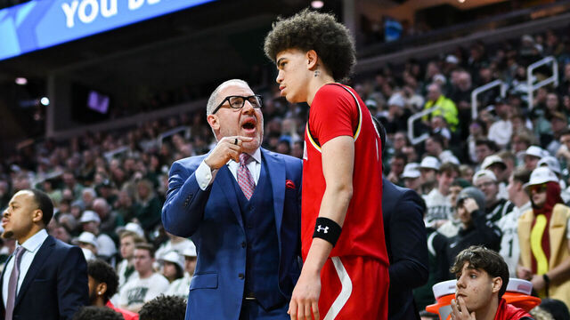 EAST LANSING, MI - JANUARY 24: Maryland Terrapins head coach Buzz Williams has a conversation with guard Darius Adams (1) on the bench during a college basketball game between the Michigan State Spartans and Maryland Terrapins on January 24, 2026 at the Breslin Center in East Lansing, MI.