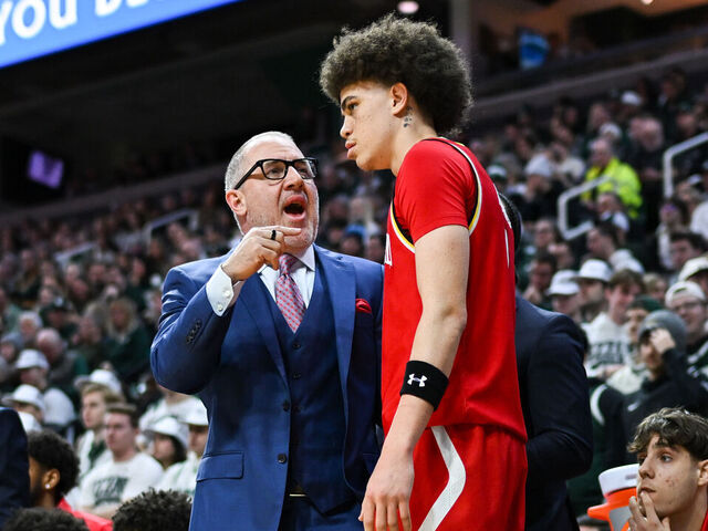 EAST LANSING, MI - JANUARY 24: Maryland Terrapins head coach Buzz Williams has a conversation with guard Darius Adams (1) on the bench during a college basketball game between the Michigan State Spartans and Maryland Terrapins on January 24, 2026 at the Breslin Center in East Lansing, MI.