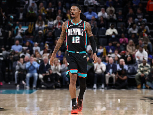 MEMPHIS, TENNESSEE - DECEMBER 30: Ja Morant #12 of the Memphis Grizzlies looks on during the game against the Philadelphia 76ers at FedExForum on December 30, 2025 in Memphis, Tennessee.